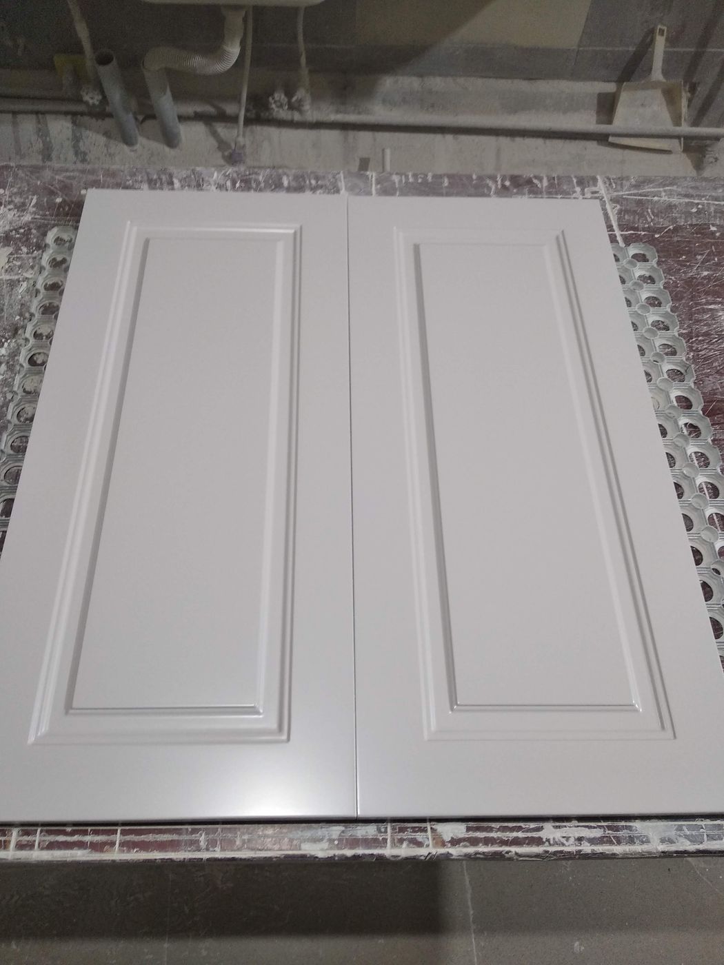 Pair of light grey panel doors